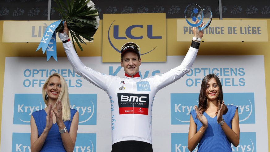 epa06062020 BMC Racing Team rider Stefan Kueng of Switzerland celebrates on the podium wearing the best young rider&#039;s white jersey following the 2nd stage of the 104th edition of the Tour de Fran ...