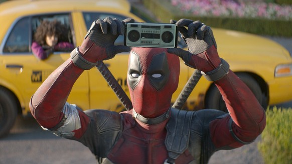 FILE - This image released by Twentieth Century Fox shows Ryan Reynolds in a scene from &quot;Deadpool 2.&quot; Fox’s “Deadpool 2” brought in $125 million according to studio estimates Sunday, May 20, ...
