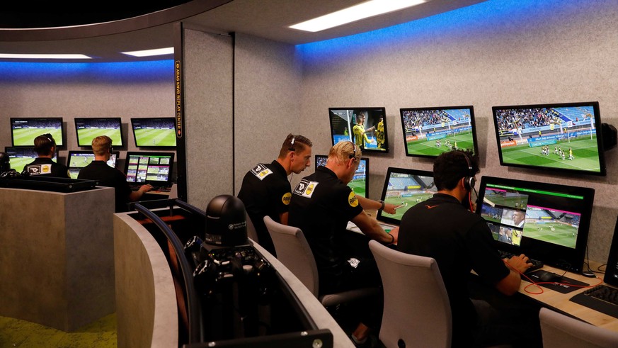 epa06945804 Video Assistant Referees (VAR) work at the Replay Center at the KNVB (Royal Dutch Soccer Association) in Zeist, The Netherlands, 12 August, 2018. EPA/BAS CZERWINSKI