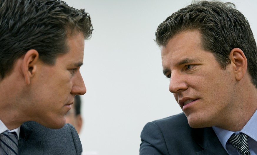 Brothers Cameron, left, and Tyler Winklevoss, Principals of Winklevoss Capital Management, share a word during a hearing called &quot;The Investor Perspective: The Future of Virtual Currencies&quot; i ...