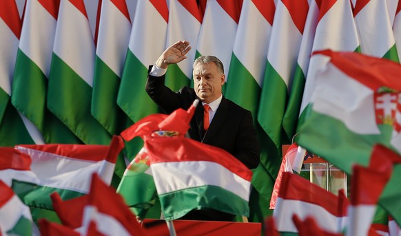 Prime Minister Viktor Orban&#039;s waves during the final electoral rally of his Fidesz party in Szekesfehervar, Hungary, Friday, April 6, 2018. Hungarians will vote Sunday in parliamentary elections, ...