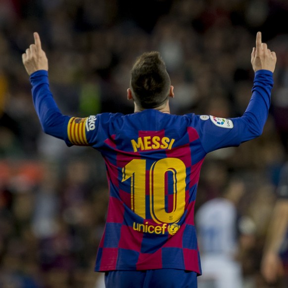 Barcelona&#039;s Lionel Messi celebrates after scoring a goal, during a Spanish La Liga soccer match between Barcelona and Alaves at Camp Nou stadium in Barcelona, Spain, Saturday, Dec. 21, 2019. (AP  ...