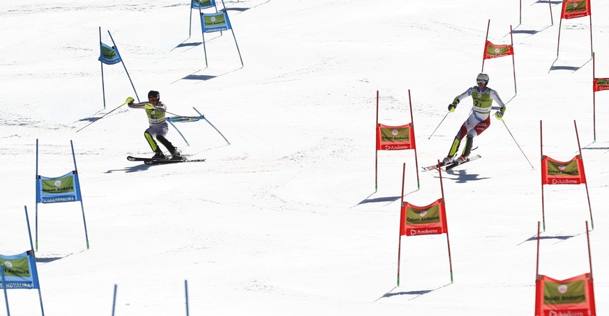 Germany&#039;s Anton Tremmel, left, and Switzerland&#039;s Ramon Zenhaeusern compete during an alpine ski, World Cup team event, in Soldeu, Andorra, Friday, March 15, 2019. (AP Photo/Gabriele Facciott ...
