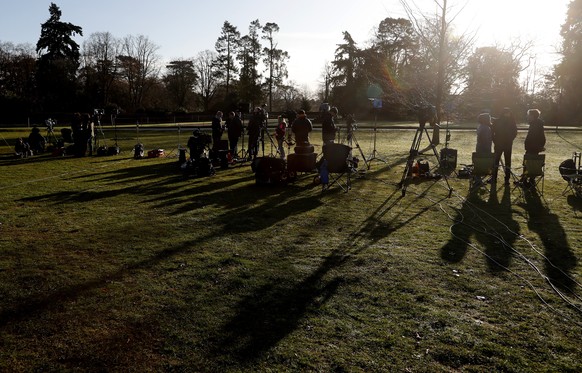 The media prepare at the entrance of Sandringham estate, Sandringham, England, early morning Monday, Jan. 13, 2020. Britain&#039;s Queen Elizabeth II is preparing for a crisis family meeting to work o ...