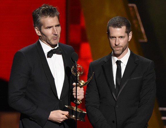 FILE - In this Sept. 20, 2015 file photo, creator-showrunners David Benioff, left, and D.B. Weiss accept the award for outstanding writing for a drama series for &quot;Game Of Thrones&quot; at the 67t ...