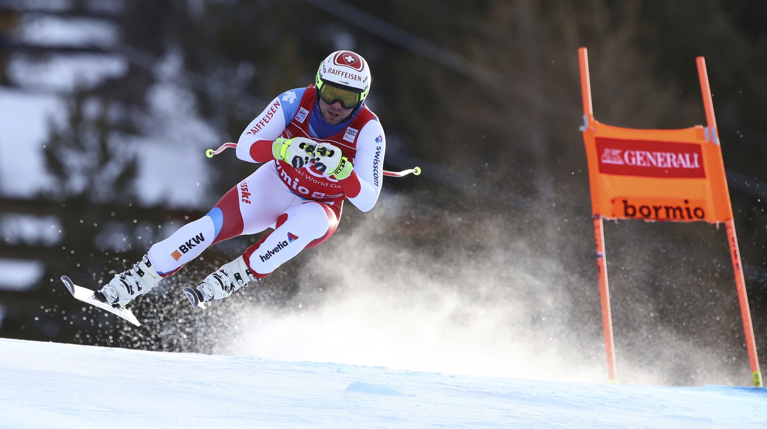 Switzerland&#039;s Beat Feuz speeds down the course during a ski World Cup Men&#039;s Downhill in Bormio, Italy, Friday, Dec.28, 2018. (AP Photo/Alessandro Trovati)