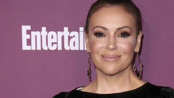 Alyssa Milano arrives at the 69th Primetime Emmy Awards Entertainment Weekly pre party at the Sunset Tower Hotel on Friday, Sept. 15, 2017, in Los Angeles. (Photo by Willy Sanjuan/Invision/AP)