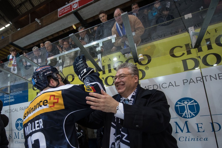 Ambri&#039;s President Filippo Lombardi right and Ambri&#039;s player Marco Müller left, celebrate the victory at the end of the game game of National League Swiss Championship 2018/19 between HC Ambr ...