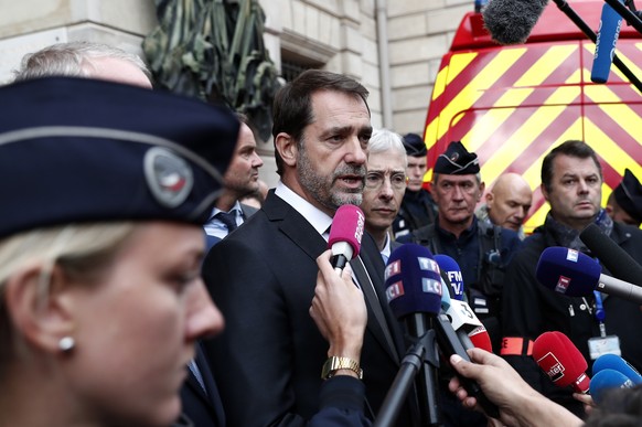 epa07892133 French Interior Minister Christophe Castaner (C) flanked by Paris Public Prosecutor, French magistrate Remy Heitz (C-L) and Paris police prefect Didier Lallement (C-R) holds a press confer ...