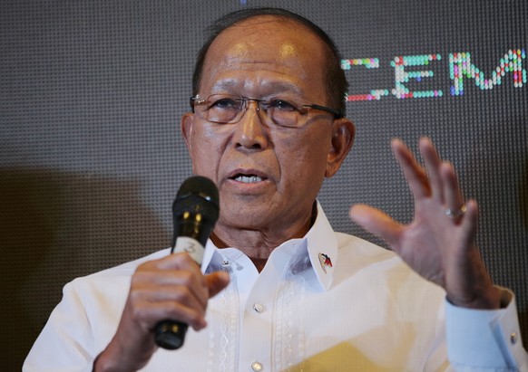 FILE - In this Dec. 8, 2016 file photo, Philippine Defense Secretary Delfin Lorenzana gestures during a press conference in Makati, south of Manila, Philippines. Lorenzana doesn’t think the U.S. and C ...