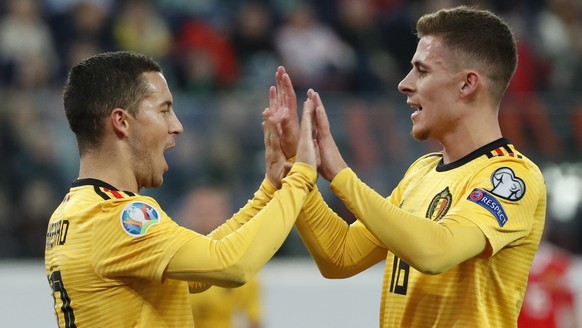 epa08002099 Eden Hazard (L) and Thorgan Hazard (R) of Belgium celebrates after scoring during the UEFA Euro 2020 Group I qualifying soccer match between Russia and Belgium at the Gazprom Arena in St.  ...
