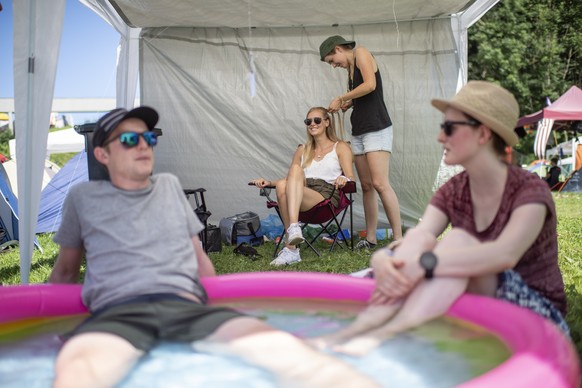 Visitors dress up on the second day of the 43. St. Gallen Openair, on Friday, June 28, 2019, in St. Gallen, Switzerland. The music festival takes place from June 27 to 30. (KEYSTONE/Gian Ehrenzeller)