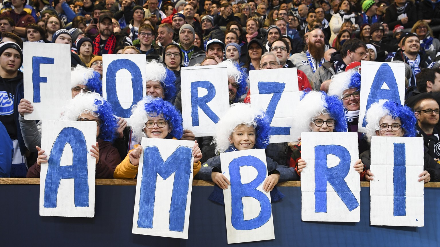 Ambri fans during the game between HC Ambri-Piotta and Salavat Yulaev Ufa, at the 93th Spengler Cup ice hockey tournament in Davos, Switzerland, Thursday, December 26, 2019. (KEYSTONE/Gian Ehrenzeller ...