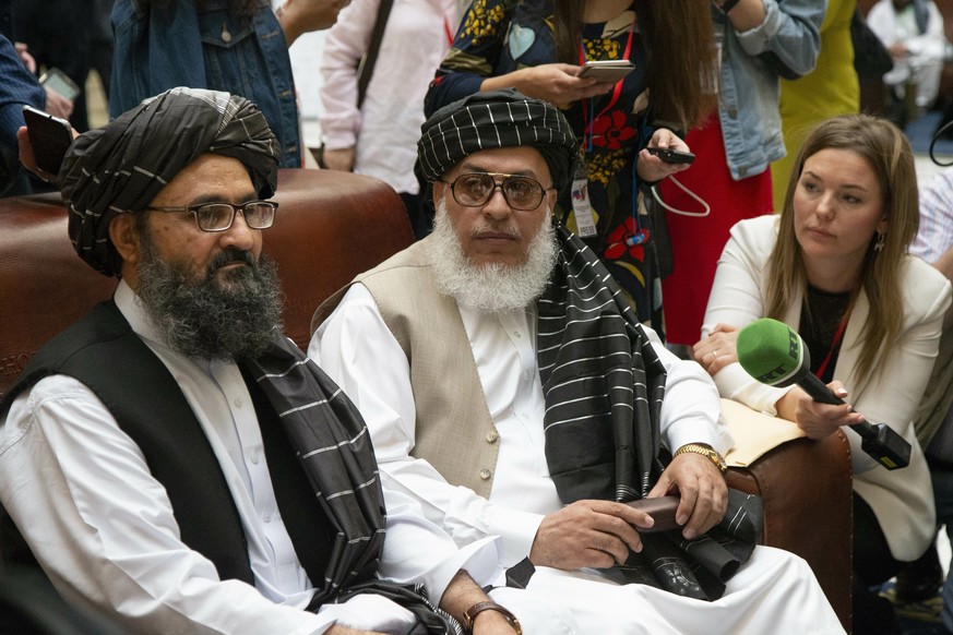 Mullah Abdul Ghani Baradar, the Taliban group&#039;s top political leader, left, and Sher Mohammad Abbas Stanikzai, the Taliban&#039;s chief negotiator speak to the media Russia, Tuesday, May 28, 2019 ...