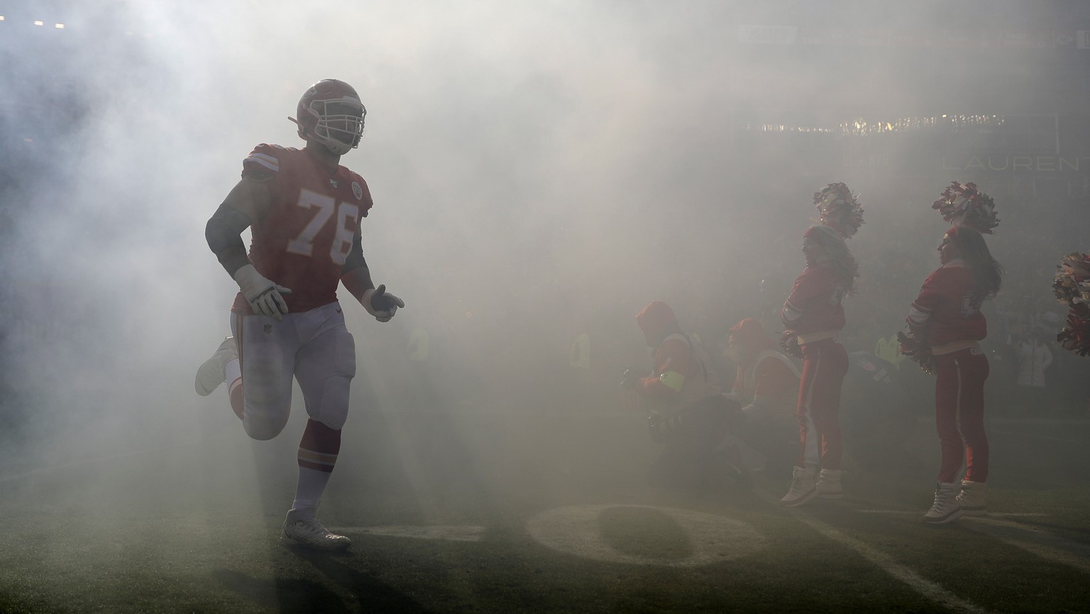 Kansas City Chiefs&#039; Laurent Duvernay-Tardif (76) is introduced before the NFL AFC Championship football game against the Kansas City Chiefs Sunday, Jan. 19, 2020, in Kansas City, MO. (AP Photo/Je ...