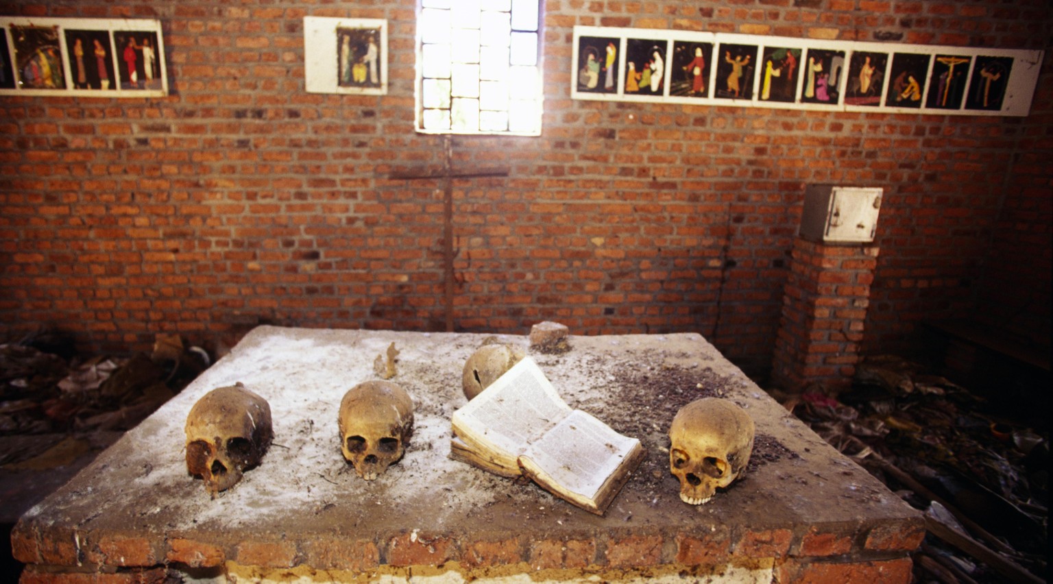 Skulls on the alter of the church at Ndera, Rwanda that is now a national monument to those who were murdered inside by Hutu militias during the 1994 genocide (Photo by In Pictures Ltd./Corbis via Get ...