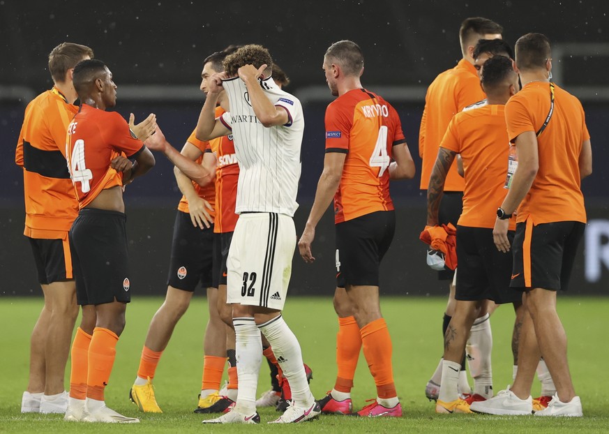 epa08598160 Yannick Marchand of Basel (C) reacts after the UEFA Europa League quarter final match between Shakhtar Donetsk and FC Basel in Gelsenkirchen, Germany, 11 August 2020. EPA/Wolfgang Rattay / ...