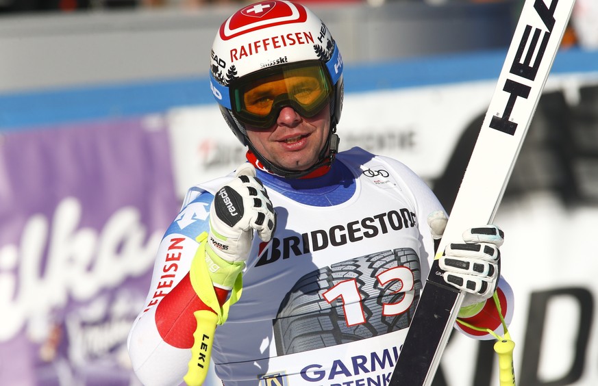Switzerland&#039;s Beat Feuz gets to the finish area after completing an alpine ski, men&#039;s World Cup downhill race, in Garmisch-Panterkirchen, Germany, Saturday, Jan. 28, 2017. (AP Photo/Giovanni ...