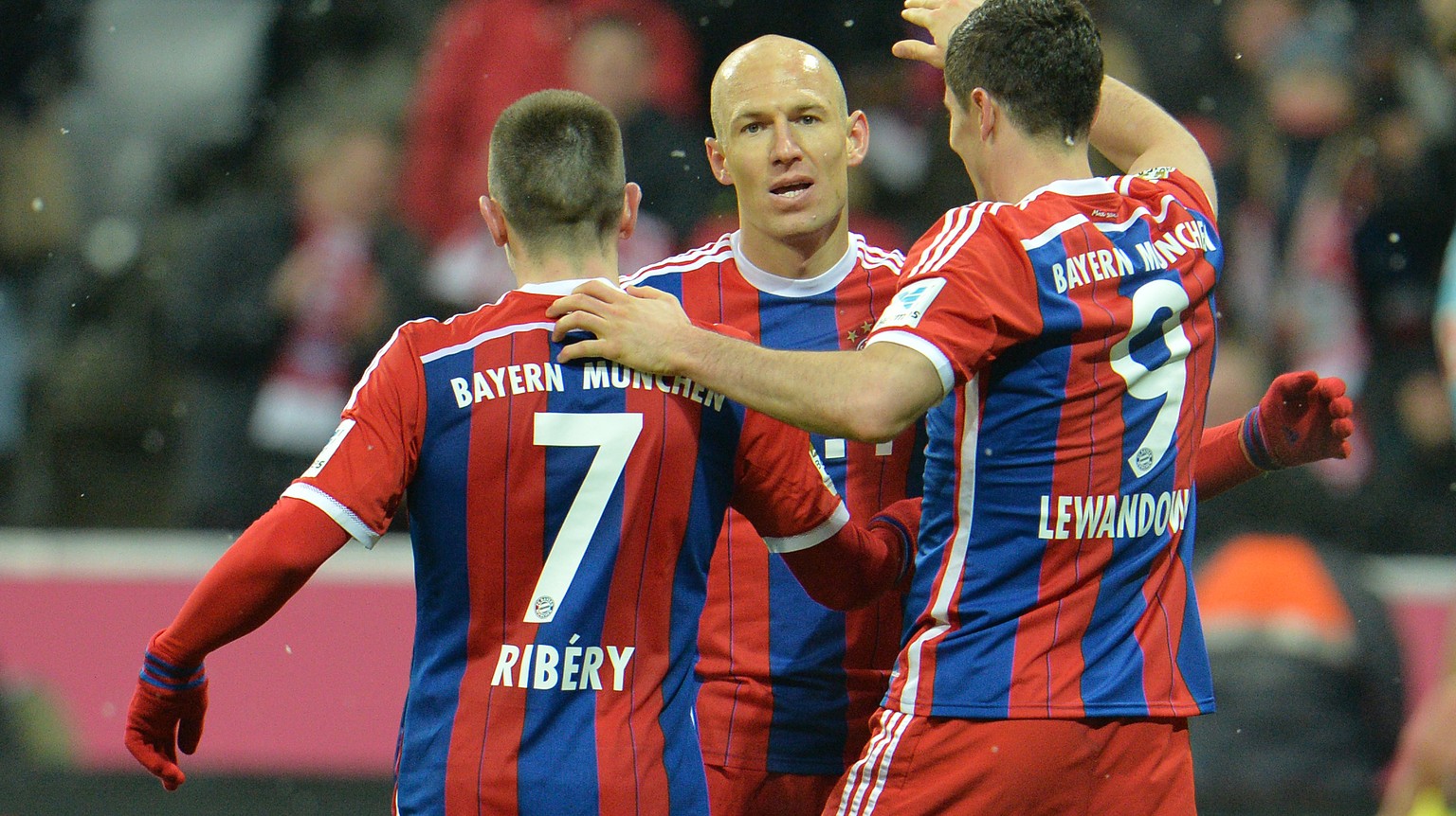 Bayern&#039;s Franck Ribery from France, Arjen Robben from the Netherlands and scorer Robert Lewandowski from Poland, from left, celebrate after scoring during the soccer match between FC Bayern Munic ...