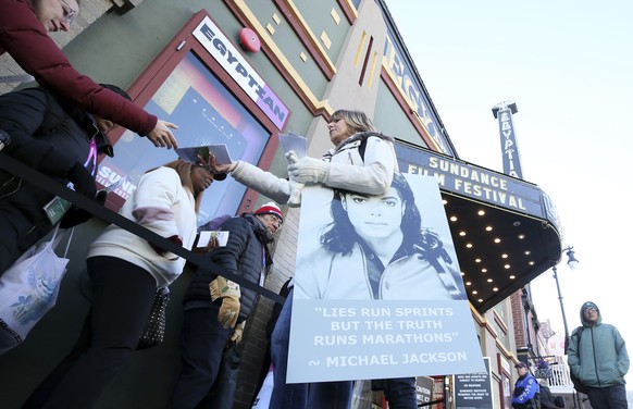 Catherine Van Tighem who drove from Calgary, Canada hands out pamphlets in support of Michael Jackson outside of the premiere of the &quot;Leaving Neverland&quot; Michael Jackson documentary film at t ...