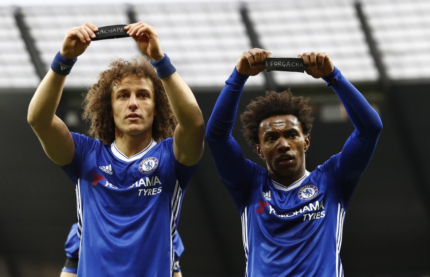 Britain Football Soccer - Manchester City v Chelsea - Premier League - Etihad Stadium - 3/12/16 Chelsea&#039;s Willian celebrates scoring their second goal with David Luiz as they hold armbands in res ...