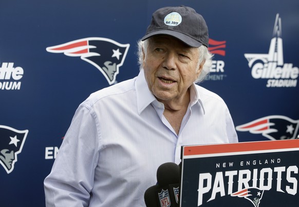 FILE - In this June 7, 2018, file photo, New England Patriots owner Robert Kraft speaks with reporters following an NFL football minicamp practice, in Foxborough, Mass. Police in Florida have charged  ...
