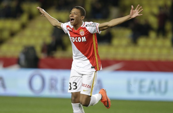 Monaco&#039;s Kylian Mbappe Lottin reacts after scoring the third goal against Troyes during their French League One soccer match, Saturday, Feb. 20, 2016, in Monaco. (AP Photo/Lionel Cironneau)