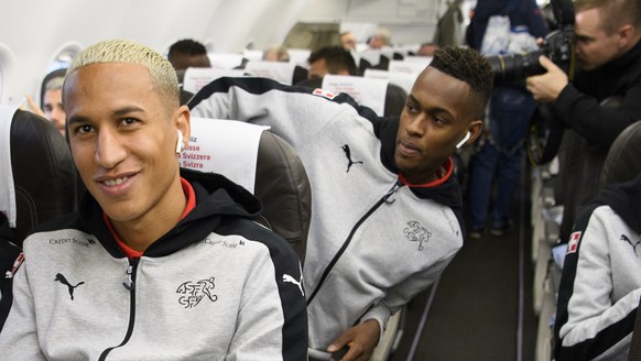 Switzerland&#039;s national team soccer players, from left, Haris Seferovic, Leo Lacroix, Edimilson Fernandes and Gelson Fernandes are pictured in a plane at the EuroAirport Basel Mulhouse Freiburg, i ...