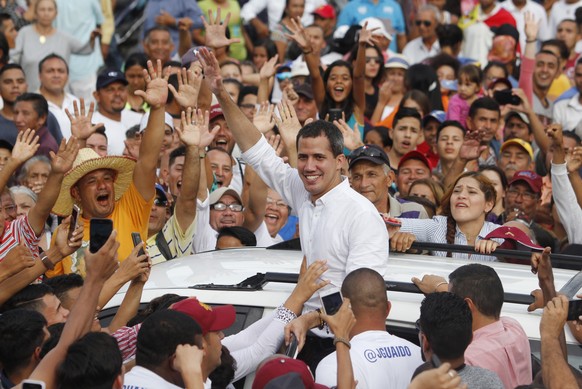 Venezuela&#039;s opposition leader and self-proclaimed interim president Juan Guaidó greets supporters at a rally in Carora, Venezuela, Saturday, May 25, 2019. Representatives of the Venezuelan govern ...