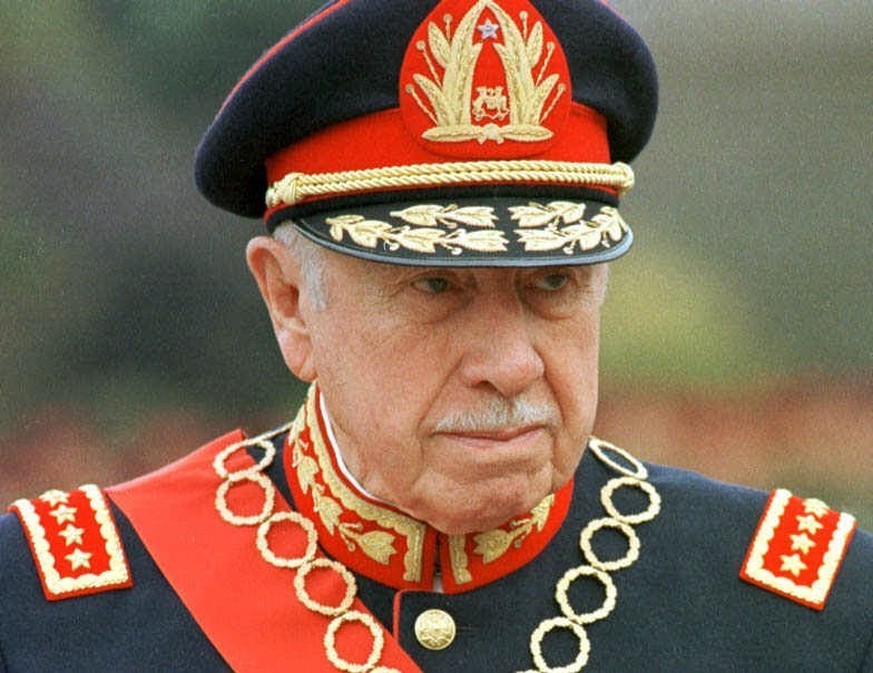 FILE - In this March 10, 1998 file photo, former Chilean dictator Gen. Augusto Pinochet is shown in Santiago, Chile. The ghosts of Chile&#039;s four-decade-old, bloody coup d&#039;etat, which led to t ...