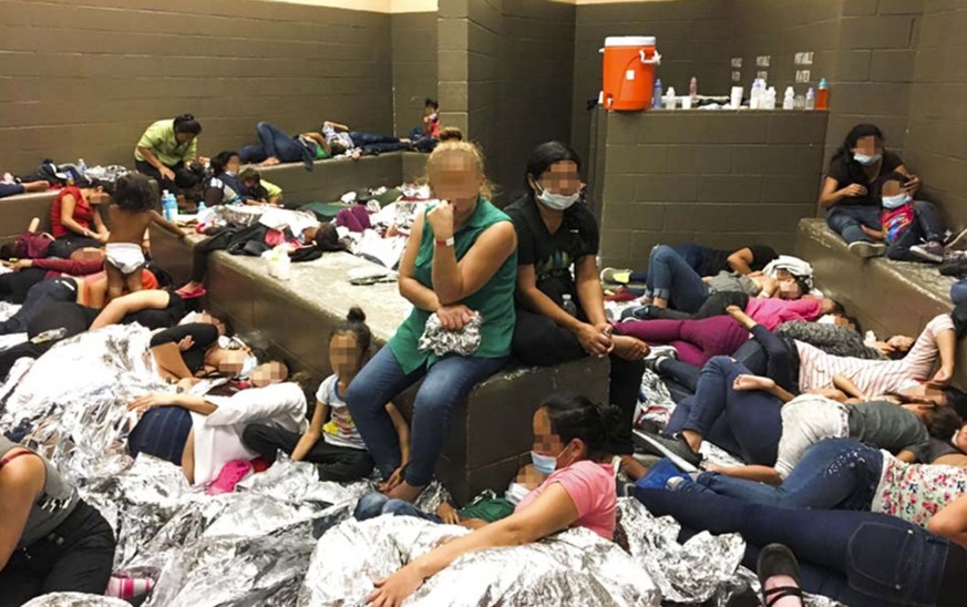 epa07690956 A handout photo made available by the Office of the Inspector General made available on 02 July 2019 shows overcrowded conditions at the US Border Patrol&#039;s McAllen holding station in  ...