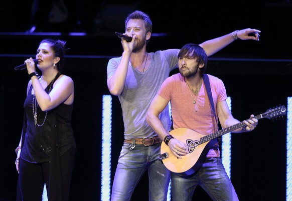 epa08480488 (FILE) - (L-R) Hillary Scott, Charles Kelley, and Dave Haywood of the US band Lady Antbellum perform at the Klipsch Music Center in Indianapolis, Indiana, 24 June 2012 (reissued 12 June 20 ...