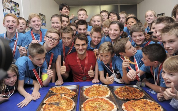 Die Balljungen freut's: Es gibt wohl auch in diesem Jahr Pizza von Roger Federer.