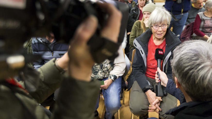 A resident of Albinen is interviewed during the communal assembly of Albinen, on Thursday, November 30, 2017, in Albinen, Switzerland. The residents of Albinen will vote on a new communal regulation t ...