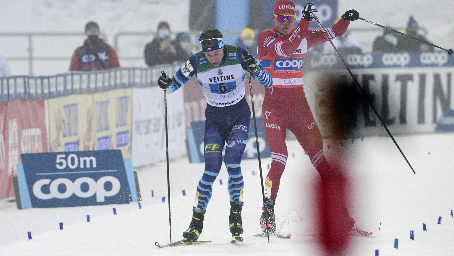 Russia&#039;s Alexander Bolshunov, right, and Joni Maki of Finland during the final meters of the men&#039;s Cross Country relay 4 x 7.5km at the FIS World Cup Lahti Ski Games in Lahti, Finland, Sunda ...