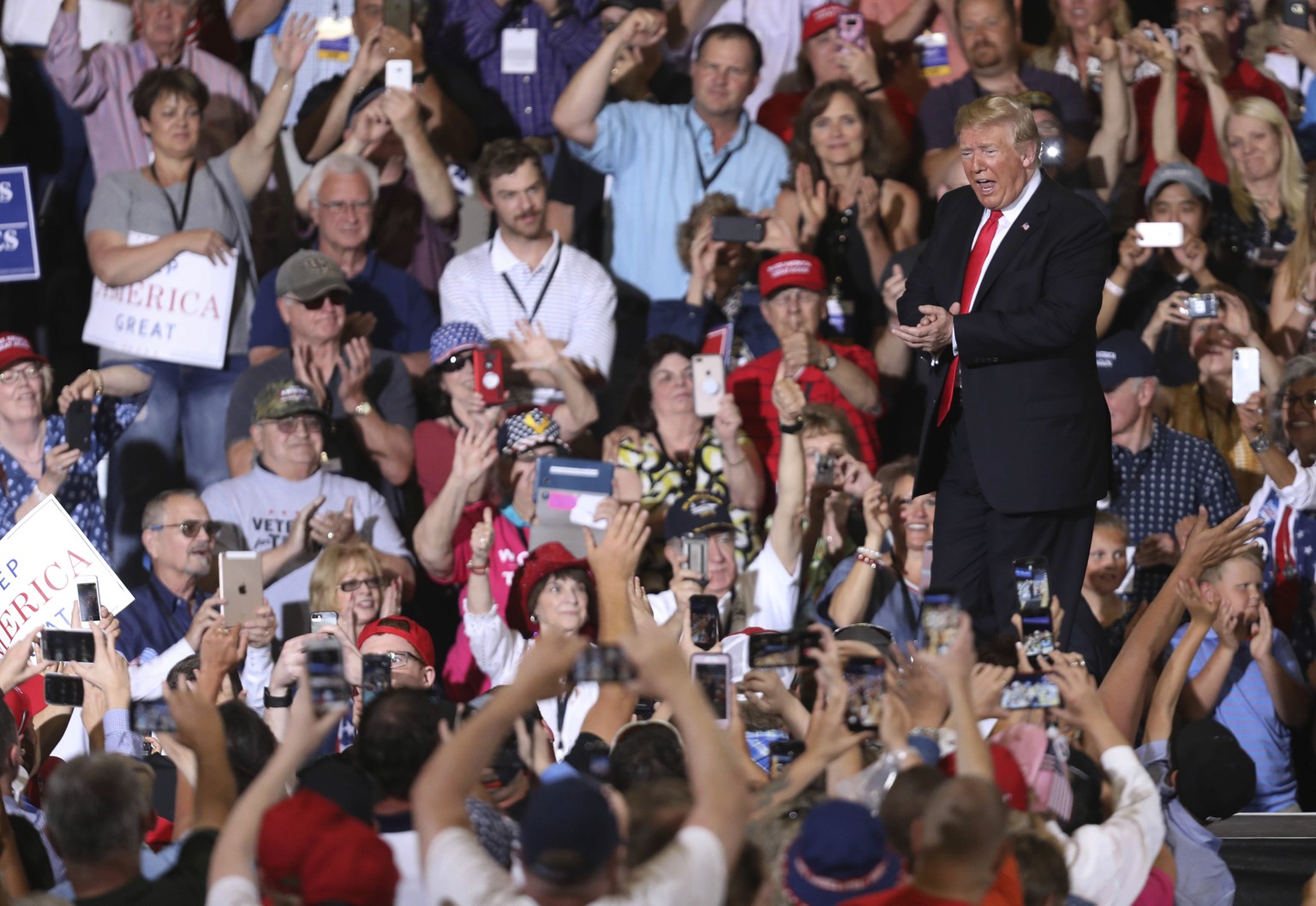 President Donald Trump applauds the audience after his remarks during a rally at the Four Seasons Arena at Montana ExpoPark, Thursday, July 5, 2018, in Great Falls, Mont., in support of Rep. Greg Gian ...