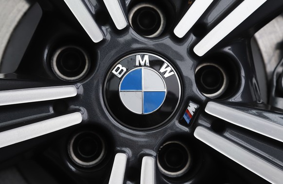 FILE - In this Feb.13, 2020 file photo, a wheel on a BMW car is on display at the 2020 Pittsburgh International Auto Show. German automaker BMW said third-quarter net profit rose 17% to 1.81 billion e ...