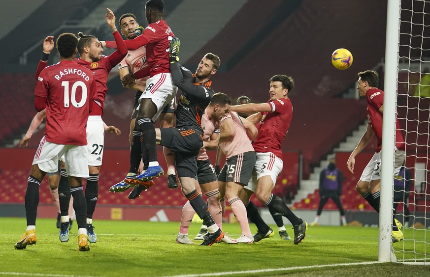 Sheffield United&#039;s Kean Bryan, third left, scores his team&#039;s first goal during the English Premier League soccer match between Manchester United and Sheffield United at Old Trafford, Manches ...