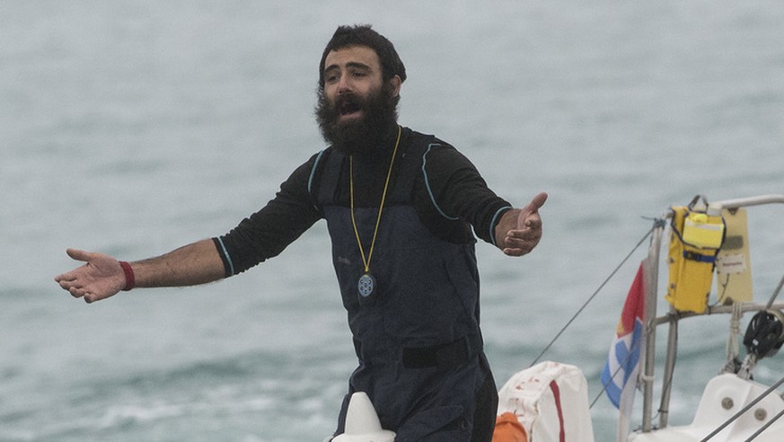 Swiss skipper Alan Roura onboard of the monohull IMOCA &quot;La Fabrique&quot; SUI7 after finishing 12th in the Vendee Globe solo around-the-world sailing race in Les Sables d&#039;Olonne harbor, west ...