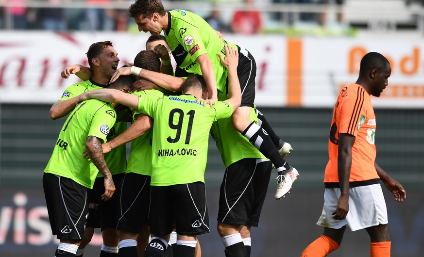 Lugano&#039;s players celebrate the 1-0 goal, during the Super League soccer match betweeen FC Lugano and FC Lausanne-Sport, at the Cornaredo stadium in Lugano, on Thursday, May 10, 2018. (KEYSTONE/Ti ...