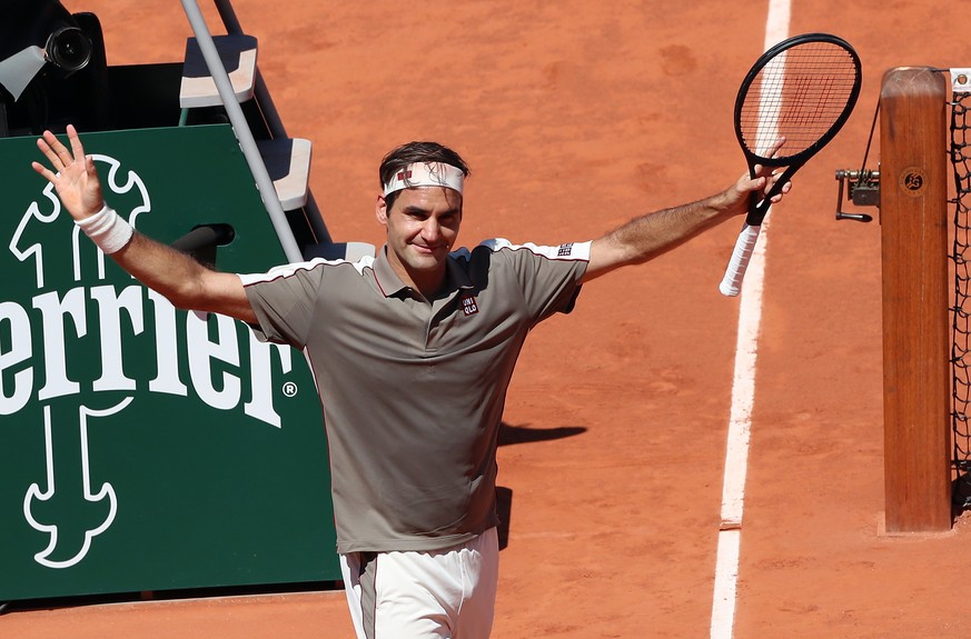 epa07620127 Roger Federer of Switzerland reacts after winning against Leonardo Mayer of Argentina their men’s round of 16 match during the French Open tennis tournament at Roland Garros in Paris, Fran ...