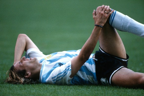 IMAGO / Offside Sports Photography

Argentina v Cameroon 8 June 1990 - World Cup 1990 - Argentina v Cameroon - Claudio Caniggia of Argentina lies on the floor with an injury - Photo: Mark Leech / Offs ...