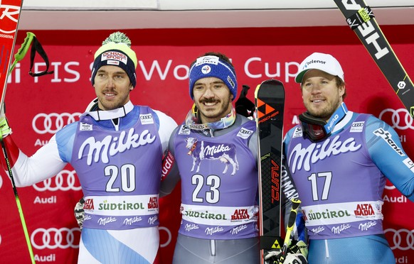 France&#039;s Cyprien Sarrazin, center, winner of an alpine ski, men&#039;s World Cup giant slalom, poses with second placed Switzerland&#039;s Carlo Janka, left, and third placed Norway&#039;s Kjetil ...