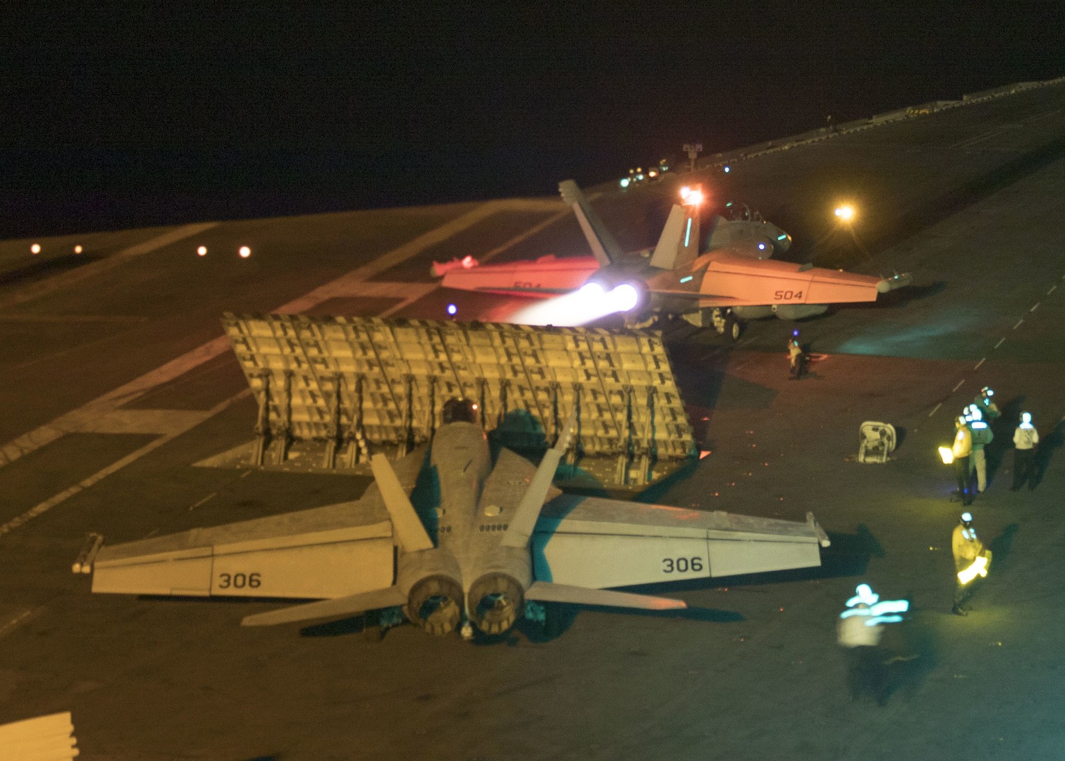 In this Friday, May 10, 2019 photo released by the U.S. Navy, an F/A-18E Super Hornet aircraft launches from the flight deck the Nimitz-class aircraft carrier USS Abraham Lincoln in the Persian Gulf.  ...
