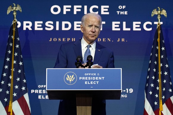 FILE - In this Nov. 9, 2020, file photo President-elect Joe Biden speaks The Queen theater in Wilmington, Del. Biden says he wants to �??restore the soul of America.�?� But first the president-elect w ...