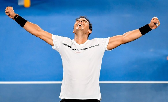 epaselect epa05754477 Rafael Nadal of Spain celebrates after winning his Men&#039;s Singles semifinal match against Grigor Dimitrov of Bulgaria at the Australian Open Grand Slam tennis tournament in M ...