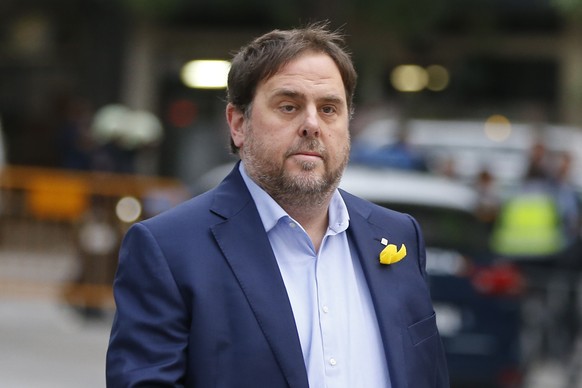 FILE - In this Nov. 2, 2017, file photo, the sacked Catalan Vice President Oriol Junqueras arrives at the National Court for questioning by a National Court judge investigating possible rebellion char ...