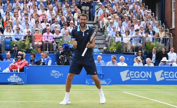 epa06050122 Marin Cilic of Croatia reacts during his game against Feliciano Lopez of Spain during the Aegon Championships tennis tournament at the Queens Club in London, Britain, 25 June 2017. EPA/FAC ...