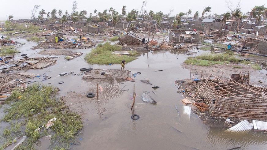 epa07447731 A handout photo made available by the International Federation of Red Cross (IFRC) showing an aerial view of the destruction of homes in Praia Nova, Beira, Mozambique, after the cycloneTro ...