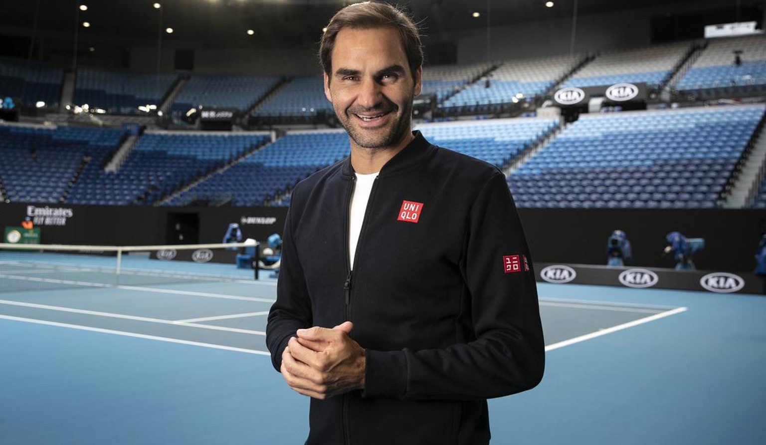 epa08118871 A handout photo made available by Tennis Australia shows Roger Federer of Switzerland posing for a photo during a practice session ahead of the Australian Open tennis tournament at Rod Lav ...